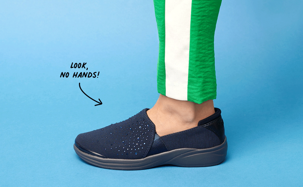 A foot sliding into a shoe with no hands