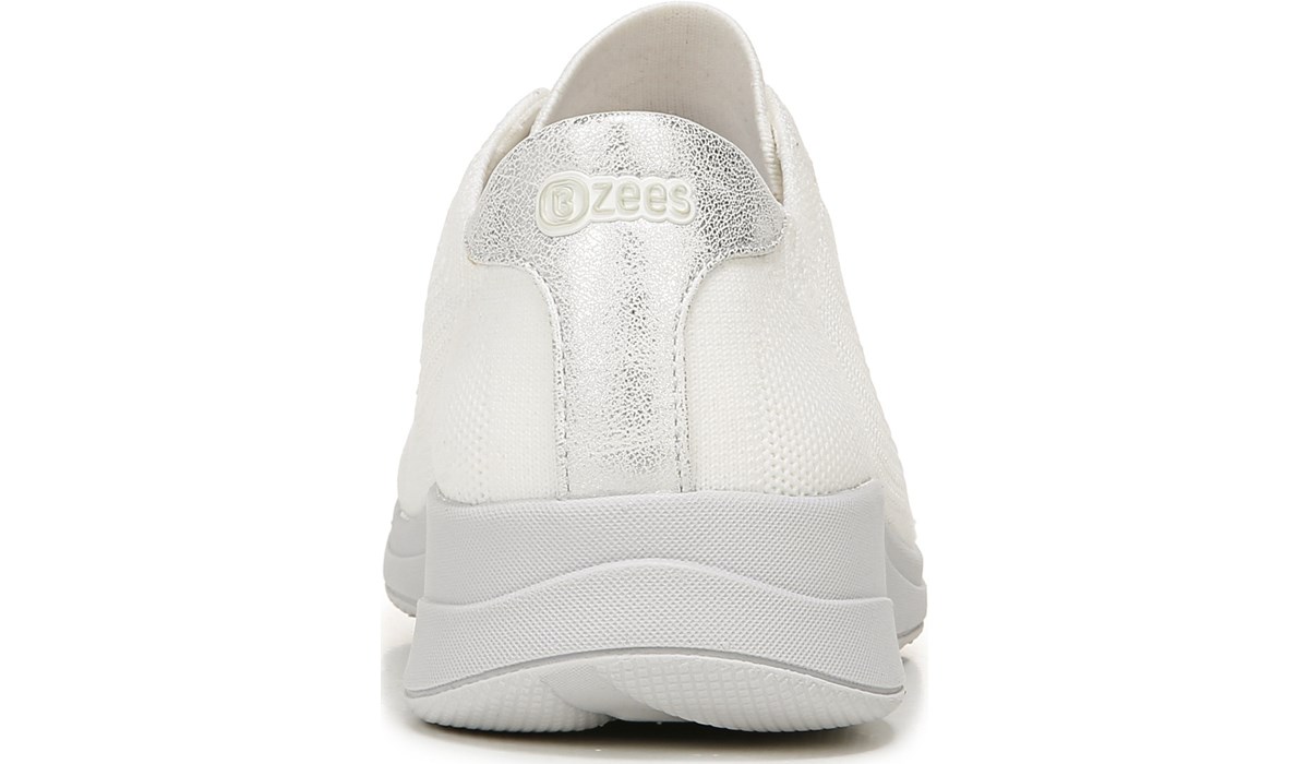white knitted slip on trainers